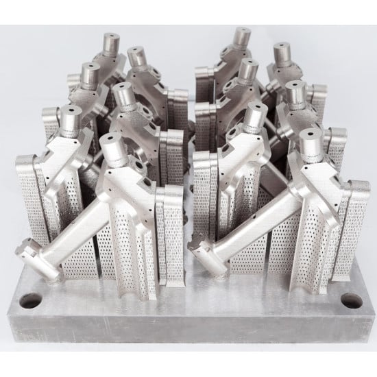 A build plate of 3D printed metal parts with lattice supports, produced through the AM Futures production network